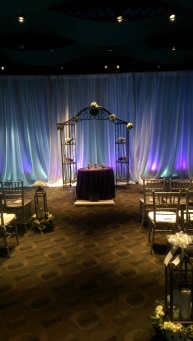 Ceremony piped and draped with lighting
